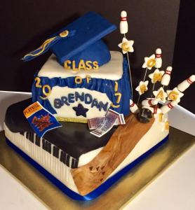 Graduation Cake for an Actor, Pianist & Bowler - Red Velvet Filling
