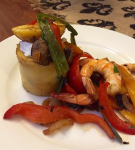 Polenta Tower with Goat Cheese and sautéed Vegetables 