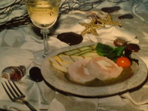 Salmon Roulade with Scallop Mousse in Sorrel Beurre Blanc accompanied by Summer Squash          